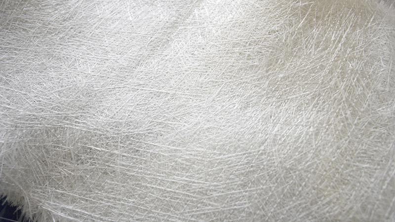Fabric of spun fiberglass.