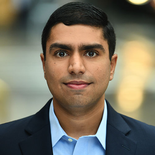 Headshot of Neil Merchant.