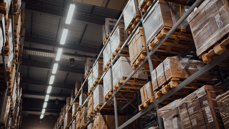 A warehouse with palettes of wrapped products.