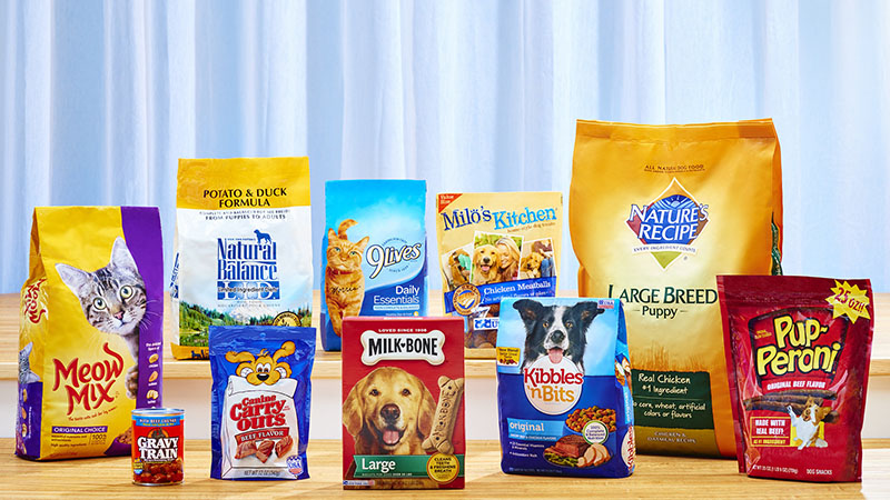 A display of various brands and types of pet food.