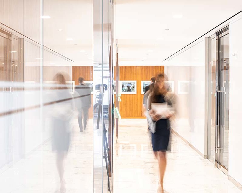 Woman walking in hallway blurred